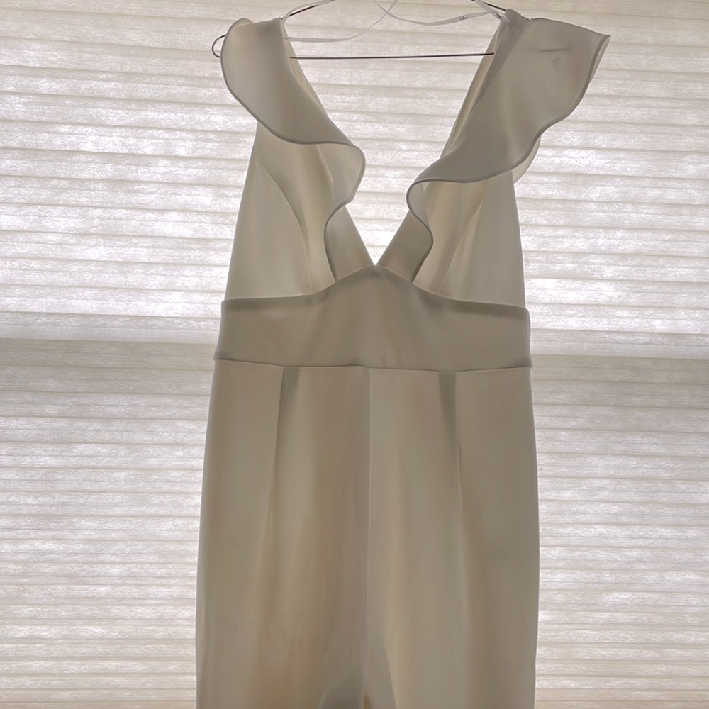 Lulu’s white ruffled jumpsuit, size L